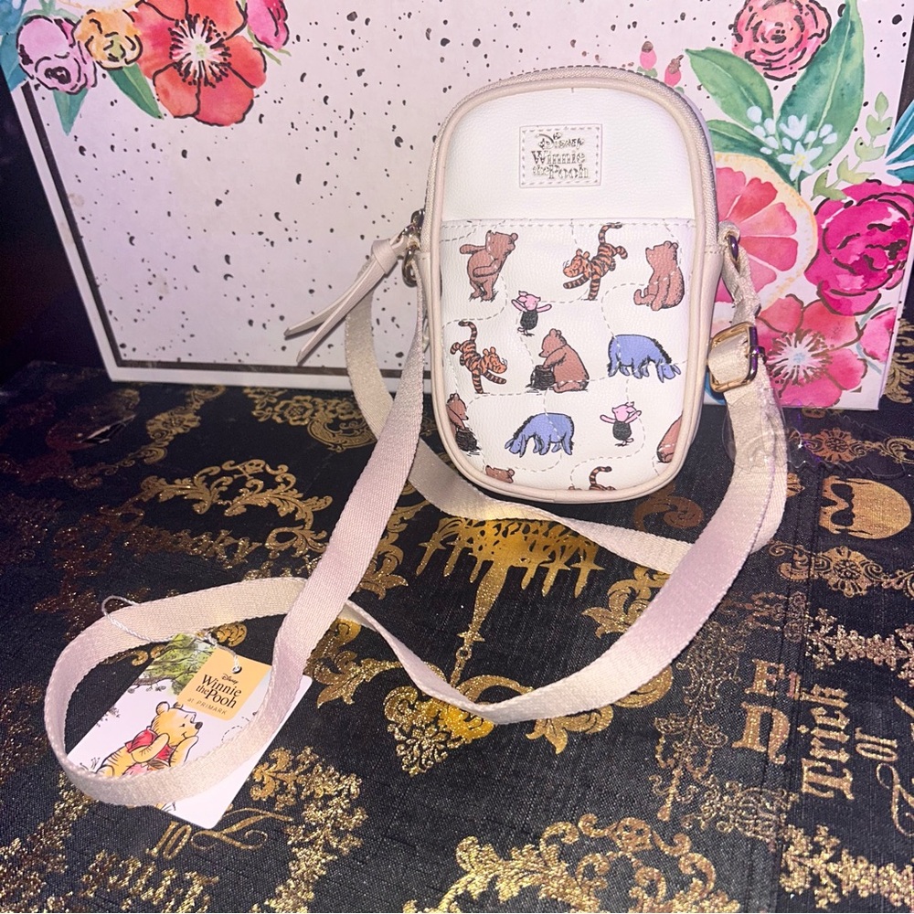 Winnie the Pooh phone holder with zip closure and crossbody strap